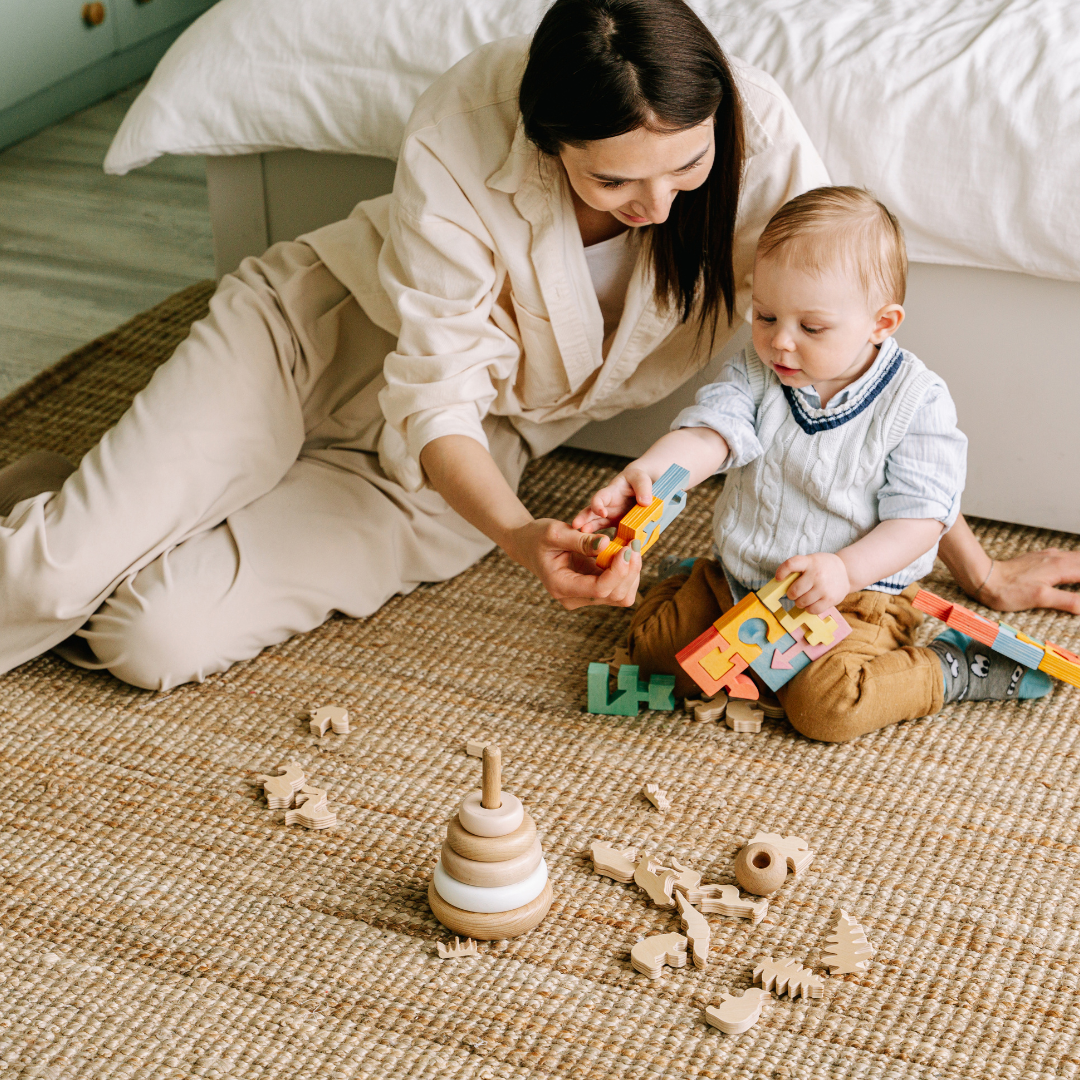 mom and baby playing