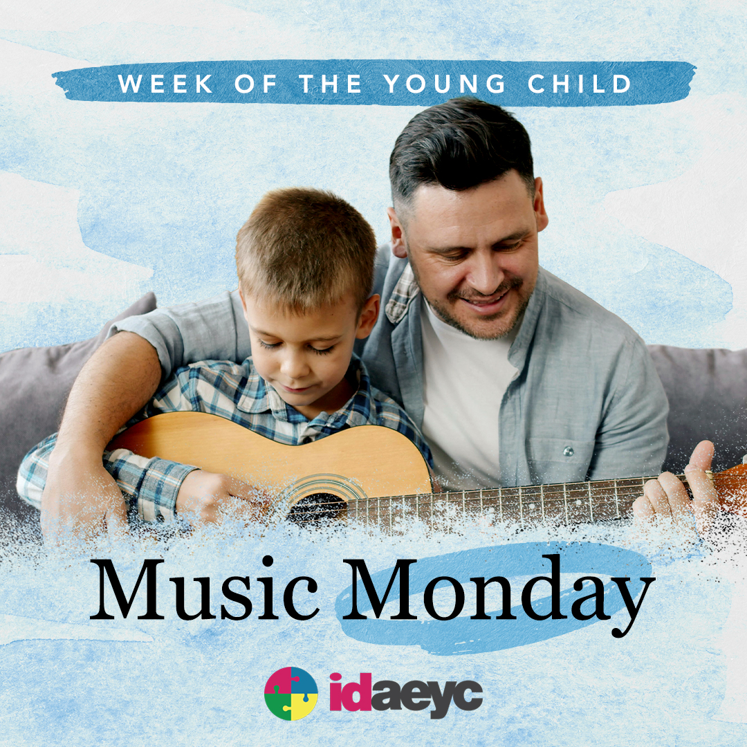 father and child play music