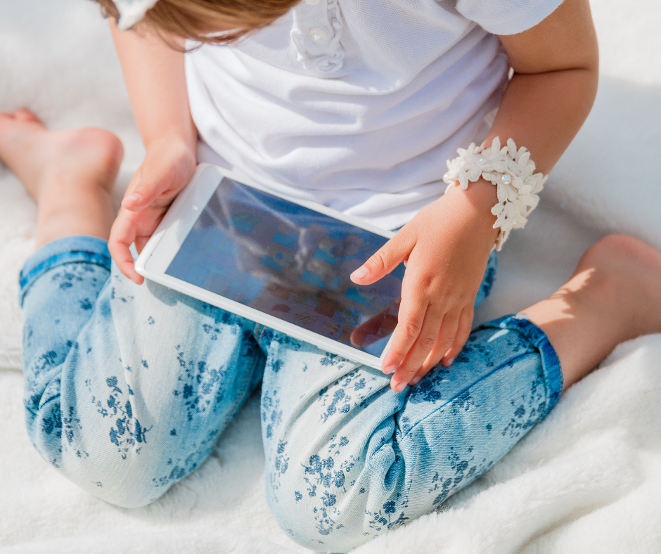 Child playing on Ipad 