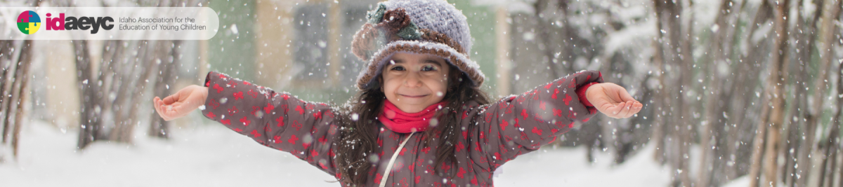 Child playing in snow