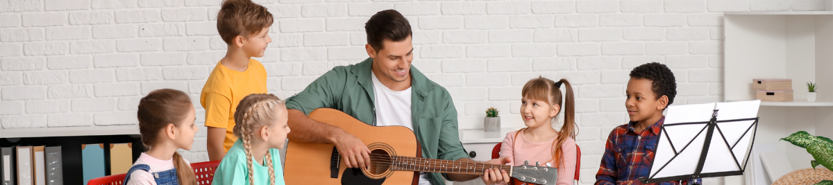 Children and man playing music 